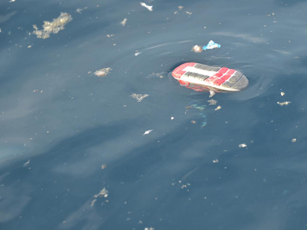 A shoe believed to belong to a passenger on board the ill-fated Lion Air flight JT 610 floats at sea in the waters north of Karawang, West Java. Picture: AFP