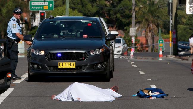 The body of Aymen Fakah lies in the middle of the road in Arncliffe. Picture: Damian Shaw