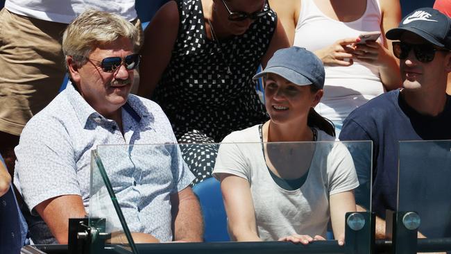 Brian Taylor and Daisy Pearce in Ash Barty’s box. Picture: Michael Klein