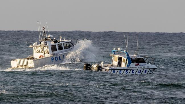 Water Police and VMR Southport rescue boat at the Spit Wall, Main Beach. Picture: Jerad Williams.