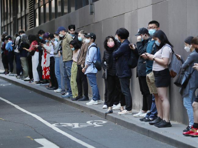 Covid testing queue for a clinic in Bourke Street as Covid numbers continue to increase across Melbourne. Picture: David Crosling