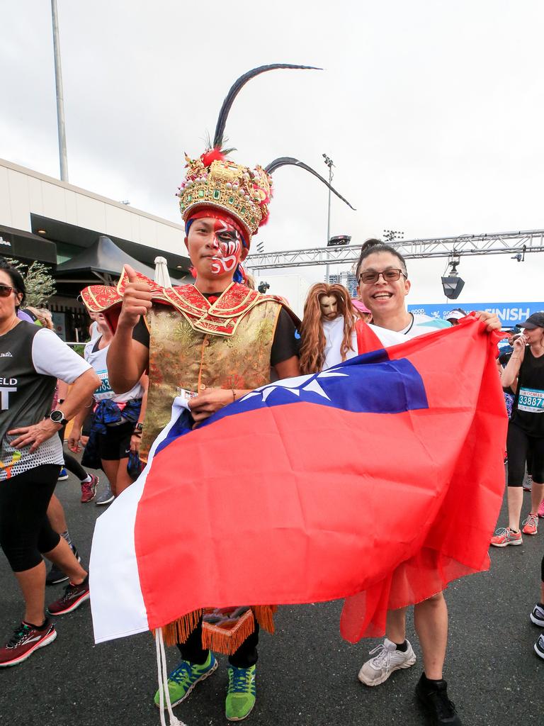 Mitch and Sam from Taiwan looking colourful at the finish line of the Southern Cross University 10 kilometre Run. Picture: Tim Marsden.