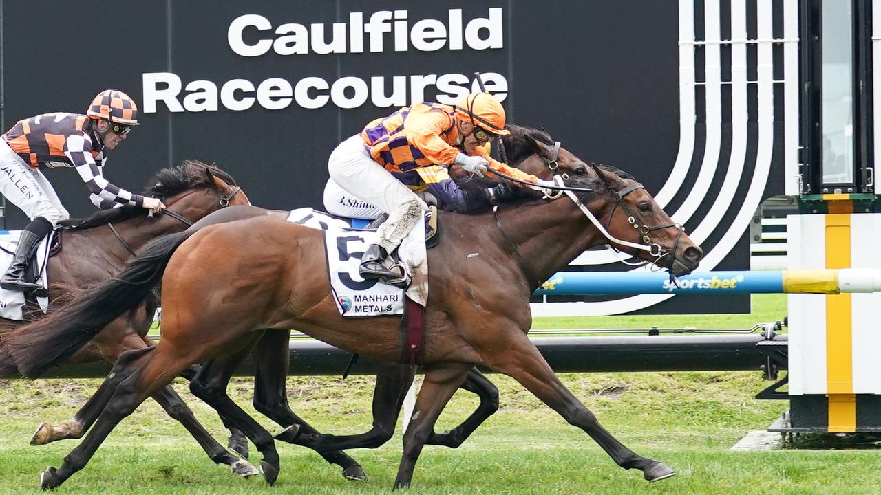 Welwal (orange and purple colours) gets the better of Arkansaw Kid to win the Kevin Heffernan Stakes at Caulfield. Picture: Scott Barbour / Racing Photos