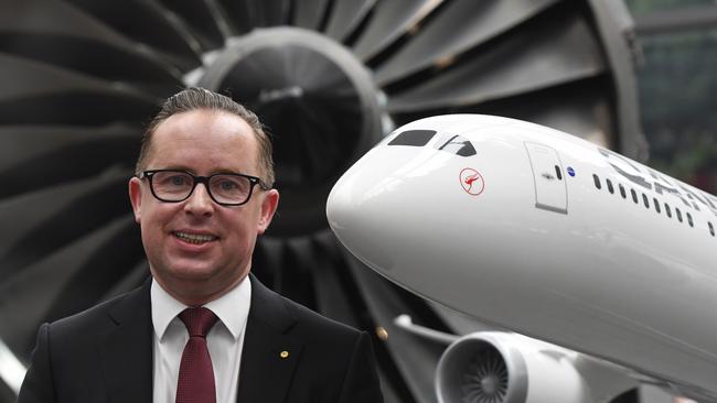 Qantas chief executive Alan Joyce announces the company's first-half profit rise of 18 per cent. Picture: AAP