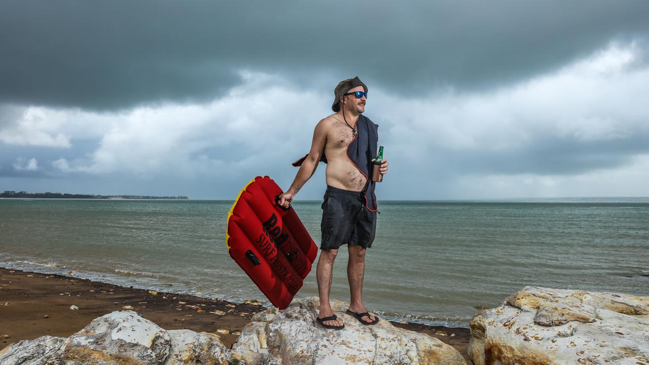 A file picture of Fannie Bay’s Tom Curran rejoicing at the Monsoon hitting Darwin Picture: Glenn Campbell