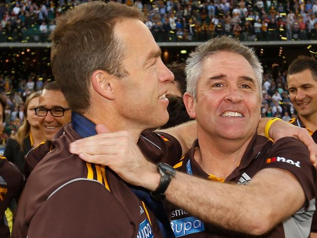 Alastair Clarkson, Senior Coach of the Hawks (left) and Chris Fagan celebrate during the 2014 Toyota AFL Grand Final match between the Sydney Swans and the Hawthorn Hawks at the MCG, Melbourne on September 27, 2014. (Photo: Michael Willson/AFL Media)