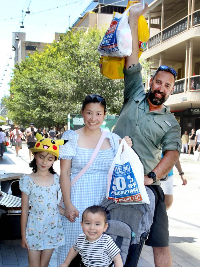 Christmas shopping in Rundle Mall. Steve and Cyndi Sedecki of West Lakes, with kids, Kasper, 2, and Alina, 7. Picture: Dean Martin