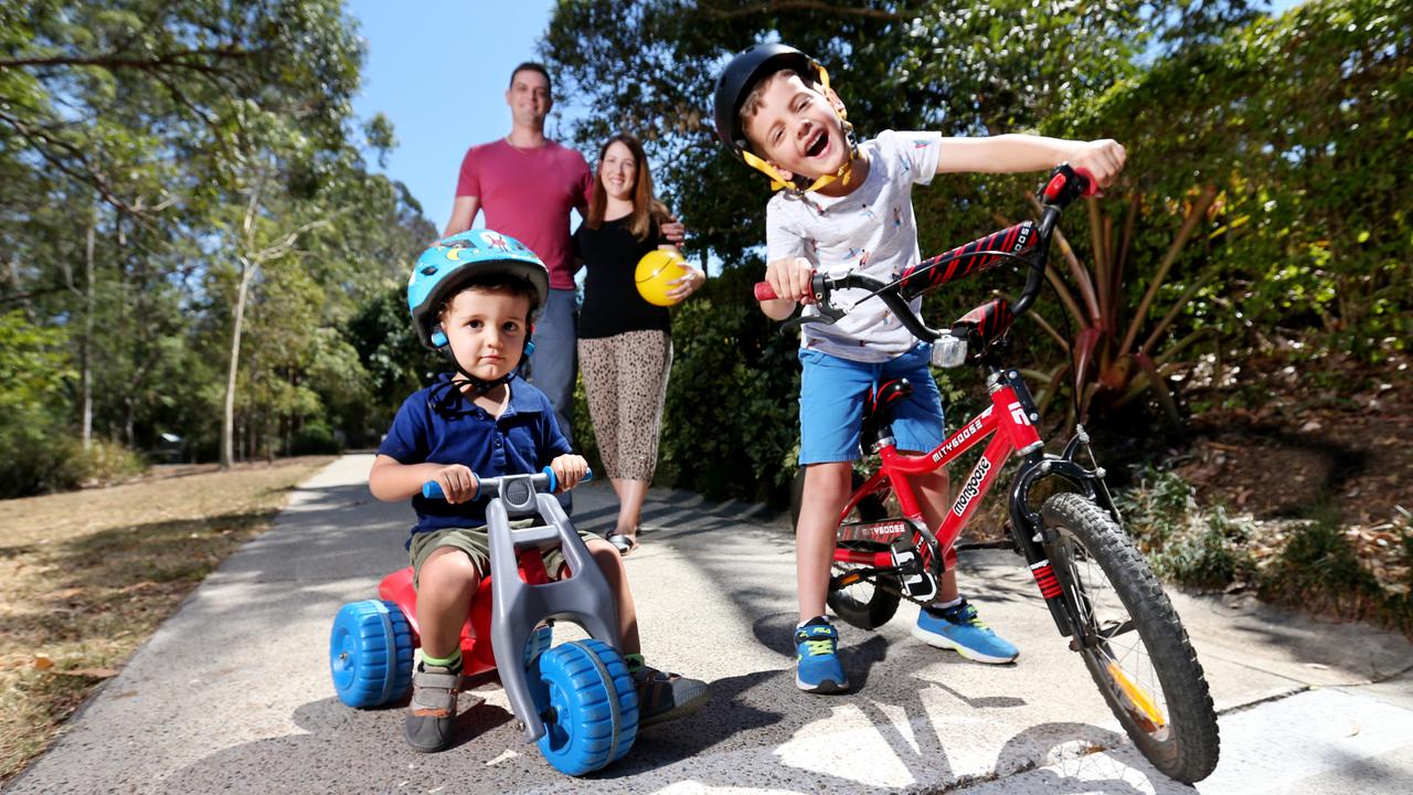 Parents Cameron and Natasha D’Arcy in the park with their kids Wilbur (6) and Victor (2). Picture: AAP