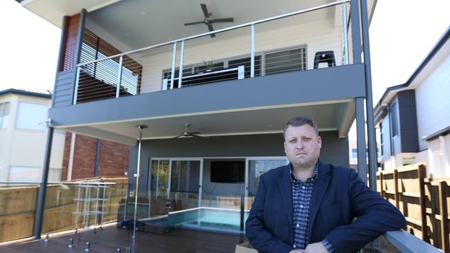 David Adams at his unfinished Q1 home at Wavell Heights. Pic Annette Dew