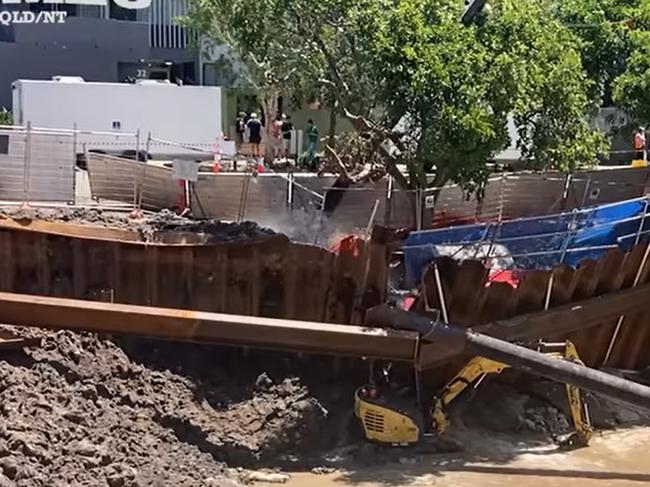 Workers were lucky to avoid injury, with an excavator crushed in the incident which also brought down trees and powerlines. Photo: CFMEU.