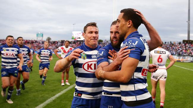 Bulldogs winger Reimis Smith celebrates a try against the Dragons. Picture: Brett Costello