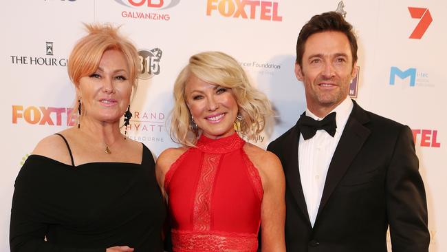 Hugh Jackman, Deborra-Lee Furness and Kerri-Anne Kennerley at the Red Ball raising money for cancer in Melbourne. Picture: Julie Kiriacoudis