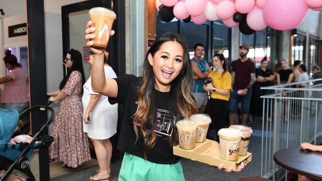 2021: Annee's Caphe Sua Da store owner Annee Nguyen infront of crowds lining up when her fourth store opened in Townsville’s Flinders Lane two years ago.