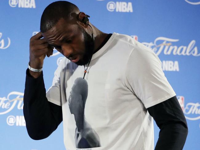 Cleveland Cavaliers' LeBron James walks up to the podium to answer questions before an NBA basketball practice, Wednesday, May 31, 2017, in Oakland, Calif. The Cavaliers face the Golden State Warriors in Game 1 of the NBA Finals on Thursday in Oakland. (AP Photo/Marcio Jose Sanchez)