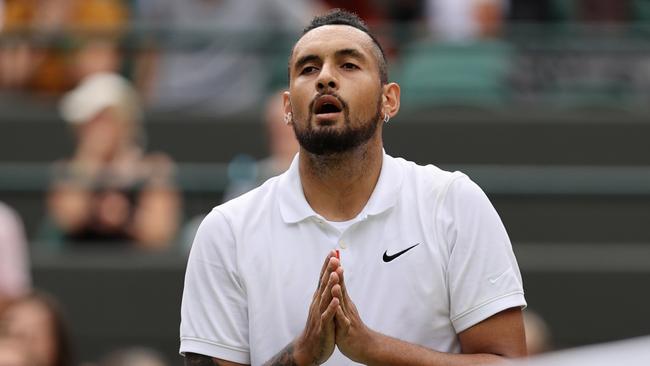 LONDON, ENGLAND – JULY 03: Nick Kyrgios of Australia interacts with the crowd after retiring injured during his men's singles third round match against Felix Auger Aliassime of Canada during Day Six of The Championships – Wimbledon 2021 at All England Lawn Tennis and Croquet Club on July 03, 2021 in London, England. (Photo by Clive Brunskill/Getty Images)