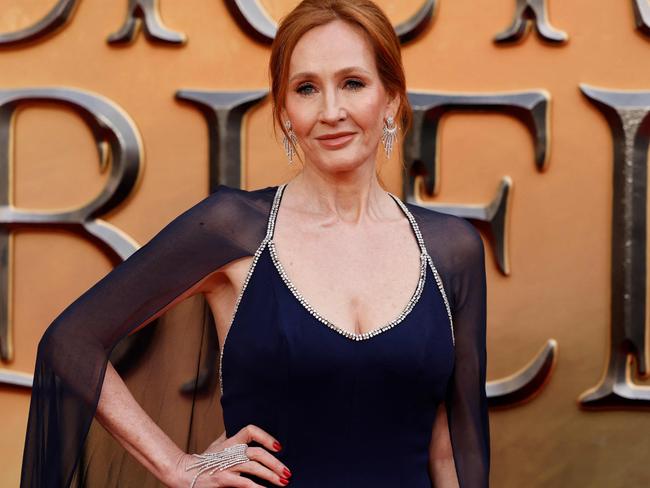 (FILES) In this file photo taken on March 29, 2022 British writer JK Rowling poses on the red carpet after arriving to attend the World Premiere of the film 