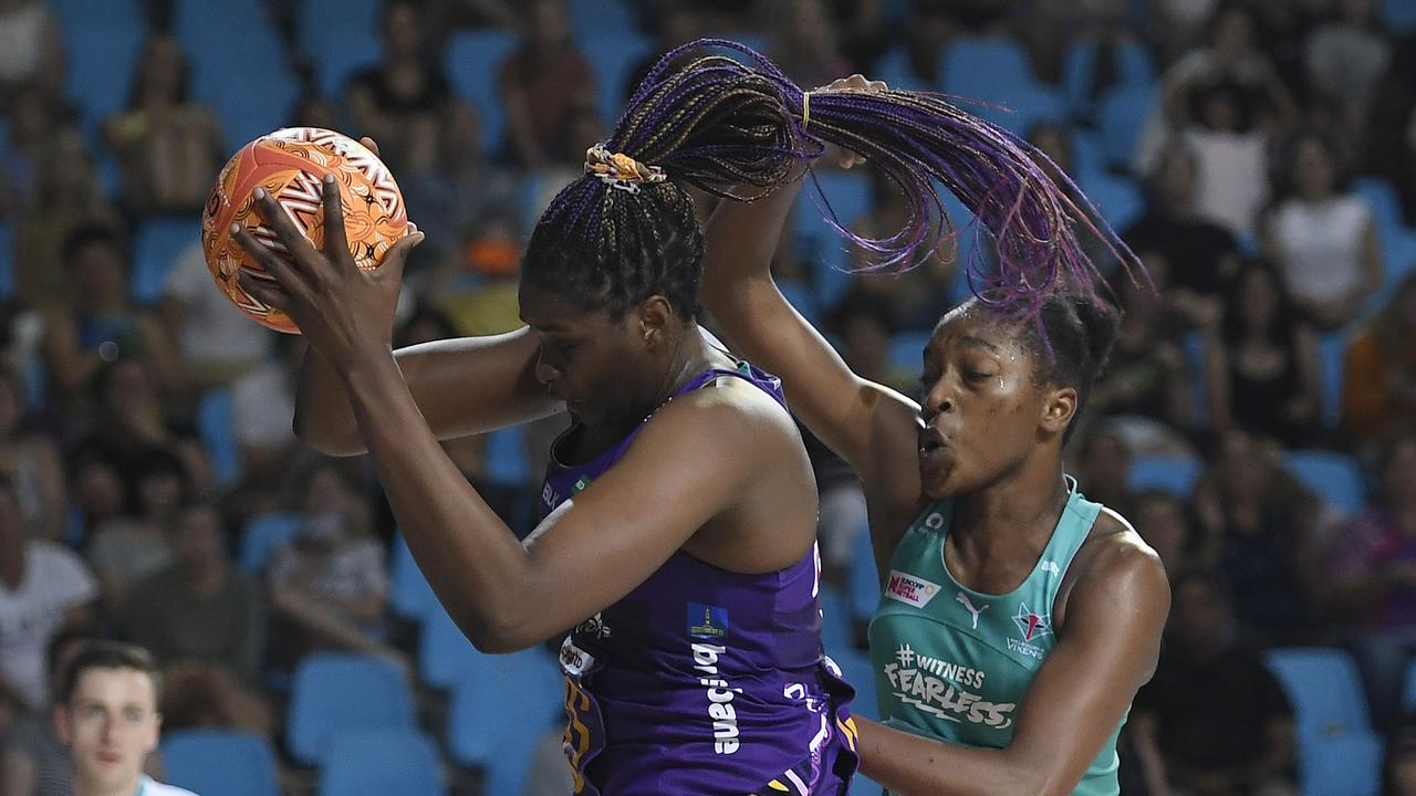 Firebirds shooter Romelda Aiken (left) battles with the Vixens’ Kadie-Ann Dehaney. Picture: Ian Hitchcock/Getty Images