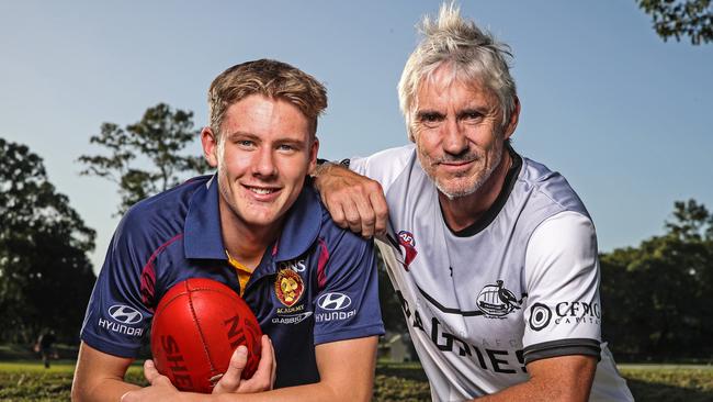 Former Lions player Adrian Fletcher alongside son Jaspa Fletcher, who is a potential father-son selection for Brisbane at this year’s draft. Picture: Zak Simmonds