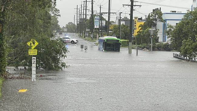 A bus was swept up in flood waters on the Northern Gold Coast on New Year’s Day 2024. Picture: Charlton Hart