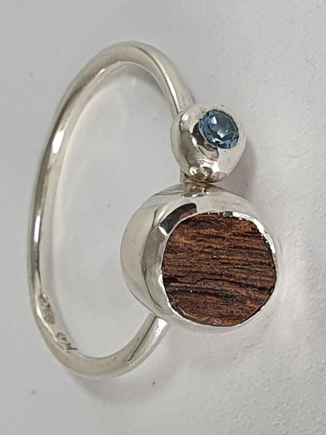 Naomi Schwartz ring with Henley Jetty wood and an aquamarine.