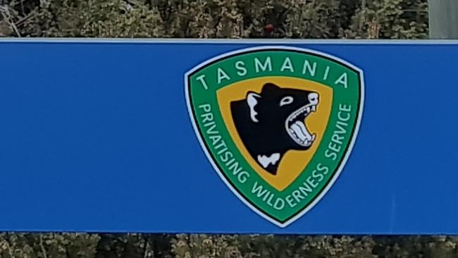 Image of Tasmanian Parks and Wildlife Service signage in the Central Highlands which has been changed by the Group Anonymous for the Wild to read Tasmanian Privatisation Wilderness Service.