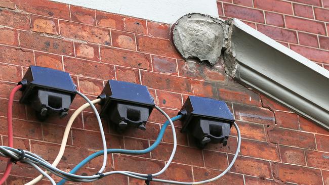 Part of the front facade fell from the main entrance of the school building last year. Picture: George Salpigtidis