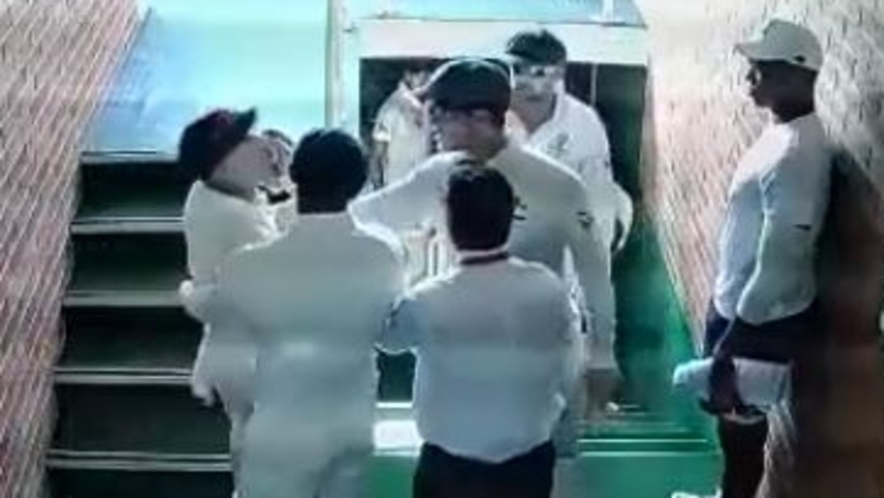 David Warner and Quinton de Kock during a staircase stoush in Durban in 2018.