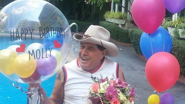 Molly Meldrum was all smiles for his birthday in Bangkok.