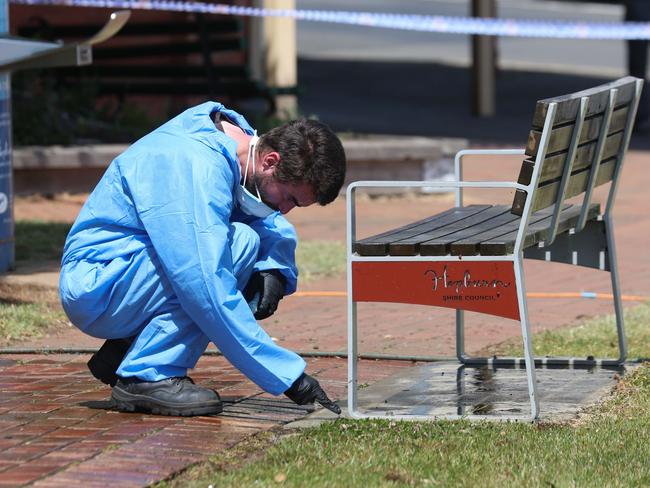 Investigators at the scene outside The Royal Daylesford Hotel. Picture: Brendan Beckett