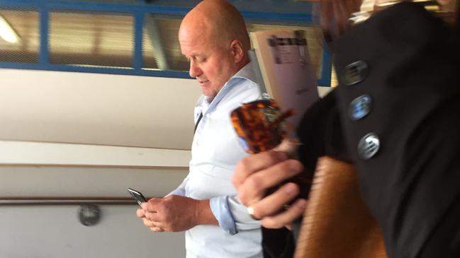 Robert Lewers leaves Cleveland Magistrates Court after pleading guilty to possessing thousands of dollars in cocaine at his North Stradbroke Island home. Picture: Marcel Baum