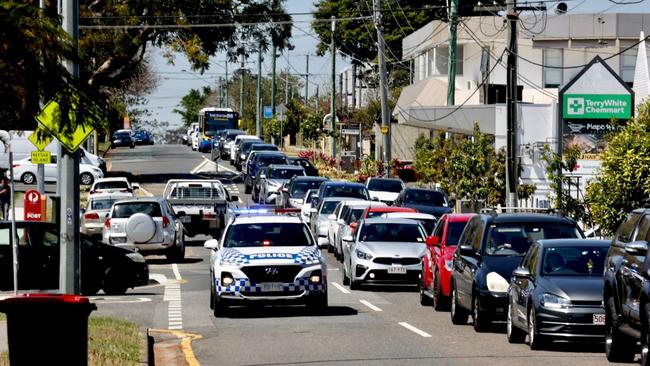 Roads backed up with hundreds of cars as parents scramble to pick up their kids at St Thomas More College in Sunnybank. Picture: NCA NewsWire / Sarah Marshall