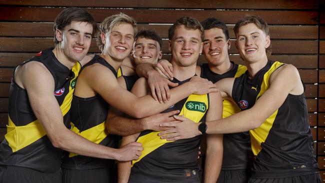 NCA. MELBOURNE, AUSTRALIA. 21th November 2024.  AFL Draft at Marvel Stadium.   First round draft selections gather at Marvel Stadium the morning after the draft  . 6 new tiger cubs. L-R.  Jonty Faull, Josh Smillie, Taj Hotton, Sam Lalor, Harry Armstrong and Luke Trainor.  Picture: Michael Klein