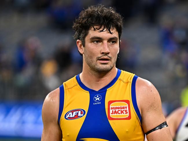 PERTH, AUSTRALIA - JUNE 08: Tom Barrass of the Eagles unhappy after the loss during the 2024 AFL Round 12 match between the West Coast Eagles and the North Melbourne Kangaroos at Optus Stadium on June 08, 2024 in Perth, Australia. (Photo by Daniel Carson/AFL Photos via Getty Images)