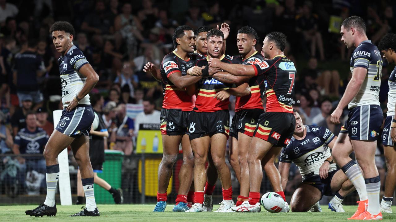 Jake Averillois congratulated by his team mates after scoring a try in the National Rugby League (NRL) pre season NRL match between the North Queensland Cowboys and the Dolphins, held at Barlow Park. Picture: Brendan Radke