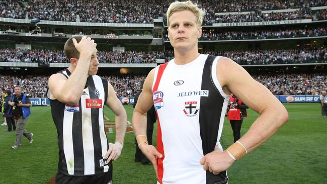 St Kilda captain Nick Riewoldt and Collingwood captain Nick Maxwell after the 2010 drawn Grand Final.