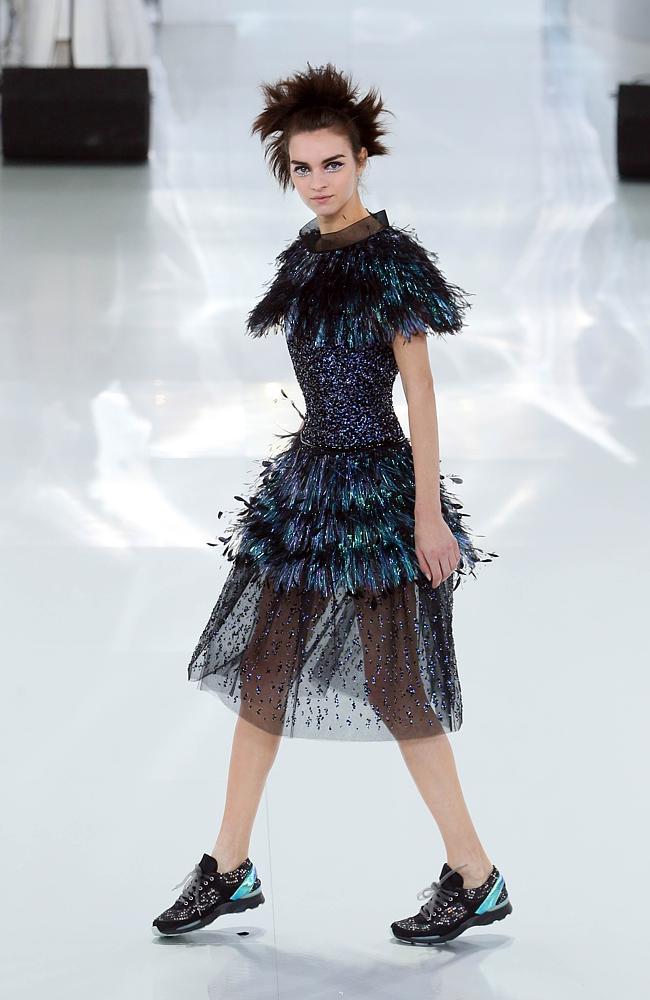  On the run! Peacock feathers featured in Lagerfeld's latest collection. Picture: AFP