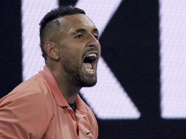 Australia's Nick Kyrgios reacts during his second round singles match against France's Gilles Simon at the Australian Open tennis championship in Melbourne, Australia, Thursday, Jan. 23, 2020. (AP Photo/Lee Jin-man)