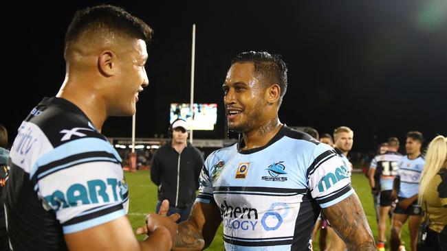 Fa'amanu Brown and Ben Barba celebrate the Sharks’ victory. Picture: Brett Costello