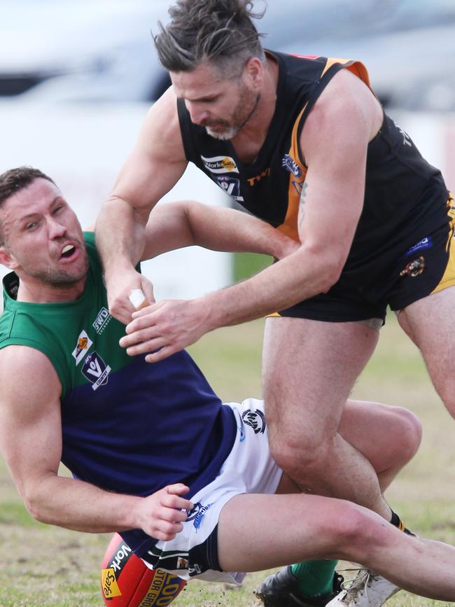 Football GFL: Grovedale v St Marys. Grovedale’s Jordan Erskine tackles St Mary’ss Jarryd Garner Picture: Mark Wilson