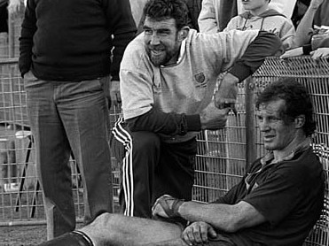 Randwick great Simon Poidevin (right) takes a breather during the Randwick v All Blacks match at Coogee Oval in 1988. His son Christian was crucial to Randwick ending its premiership drought. Picture: Brett Dooley