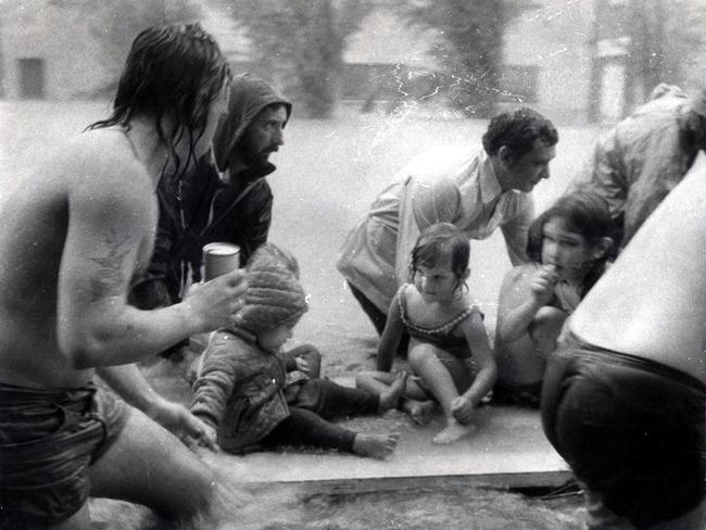 Northey Street Windsor. Children including Debbie Wemyss (C) being rafted to safety.