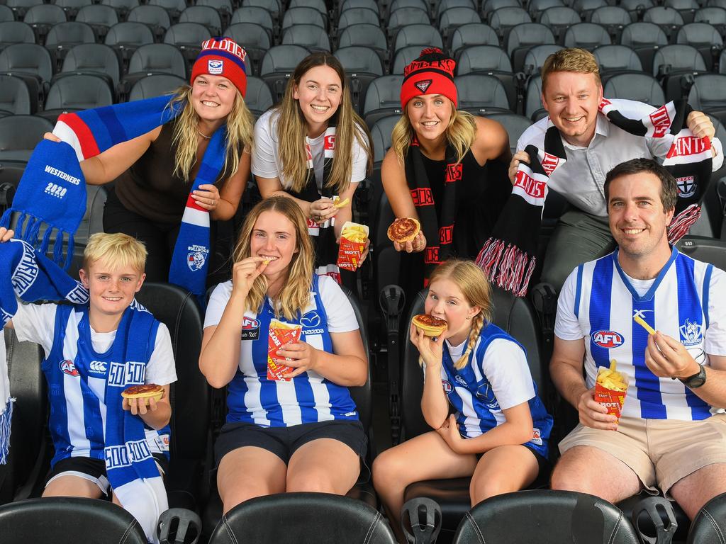 Chloe Yeats, Madeline Gibellini, Laura Attana and Eliot Bingham, Callum, Emily Hough, Peter Hough and Charlotte sample the footy food on offer. Picture: Supplied