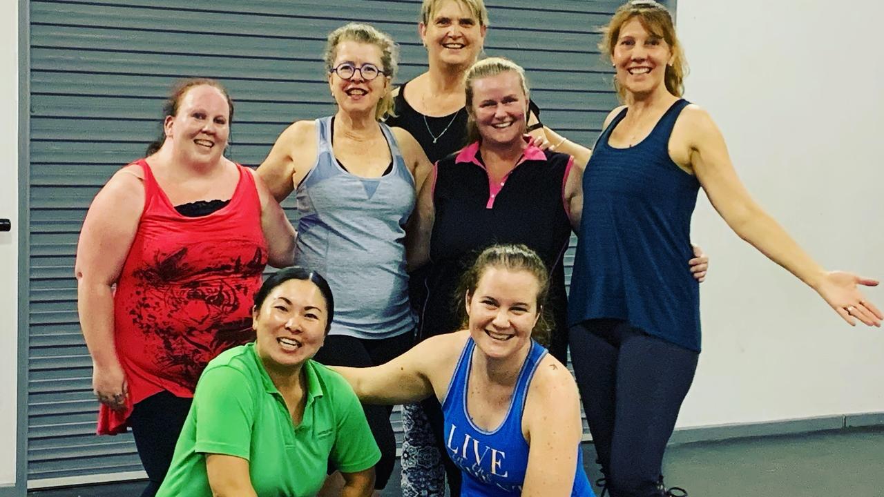 TAPFIT: Shinonu Cannell, Paula Ogilvie, Tonia Louise, Therese Woodward, Alison Knott, Danielle Lawrence and instructor Meghan Royes share a laugh after their class.