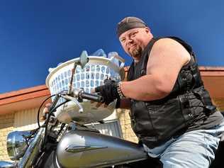 FOR A CAUSE: Eldon Morse is collecting cans and bottles on his motorcycle to raise money for the Maroochy Neighbourhood Centre. Picture: Patrick Woods