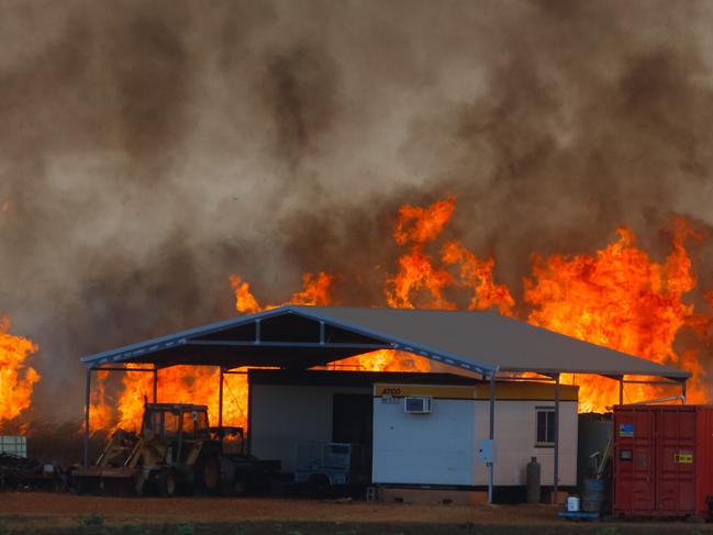 the fire front threatens farm infrastructure as Dangerous fire conditions continue  through the Litchfield/Batchelor AreaPicture GLENN CAMPBELL