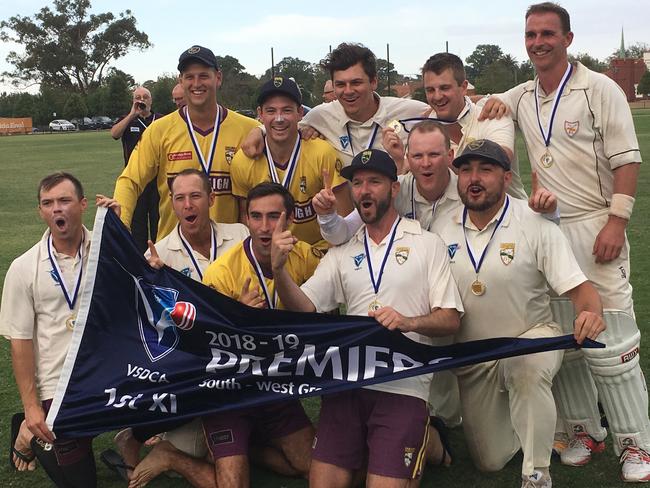 Oakleigh shows off its premiership flag after routing Elsternwick.