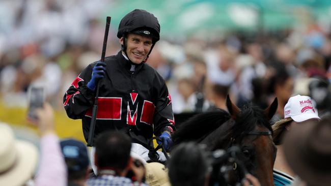 Luke Currie celebrates riding Away Game to victory in the $2 Million Magic Millions 2YO Classic last year. Picture: Regi Varghese/Getty Images