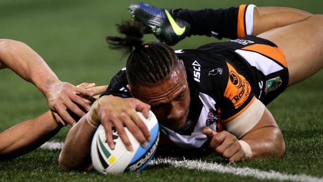 Tigers Sauaso Sue scores a try during the NRL game between the Canberra Raiders and the Wests Tigers at GIO Stadium,Canberra .Picture Gregg Porteous