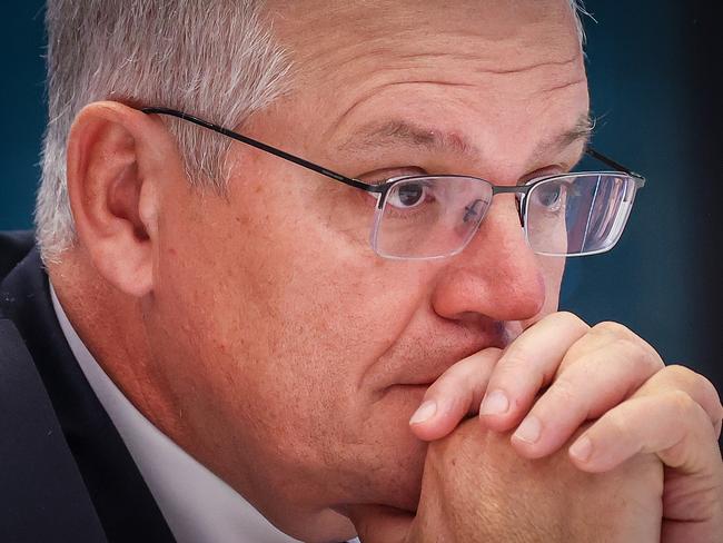 SYDNEY, AUSTRALIA - MAY 14: Prime Minister Scott Morrison prepares to speak during the Federal Budget Lunch at the Hyatt Regency Sydney on May 14, 2021 in Sydney, Australia. The Morrison government's third budget was delivered on Tuesday, with a focus on funding for women's health, aged care and infrastructure.  (Photo by David Gray/Getty Images)