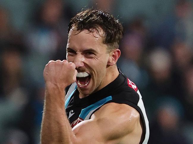 ADELAIDE, AUSTRALIA - JULY 20: Francis Evans of the Power celebrates a goal during the 2024 AFL Round 19 match between the Port Adelaide Power and the Richmond Tigers at Adelaide Oval on July 20, 2024 in Adelaide, Australia. (Photo by Sarah Reed/AFL Photos via Getty Images)